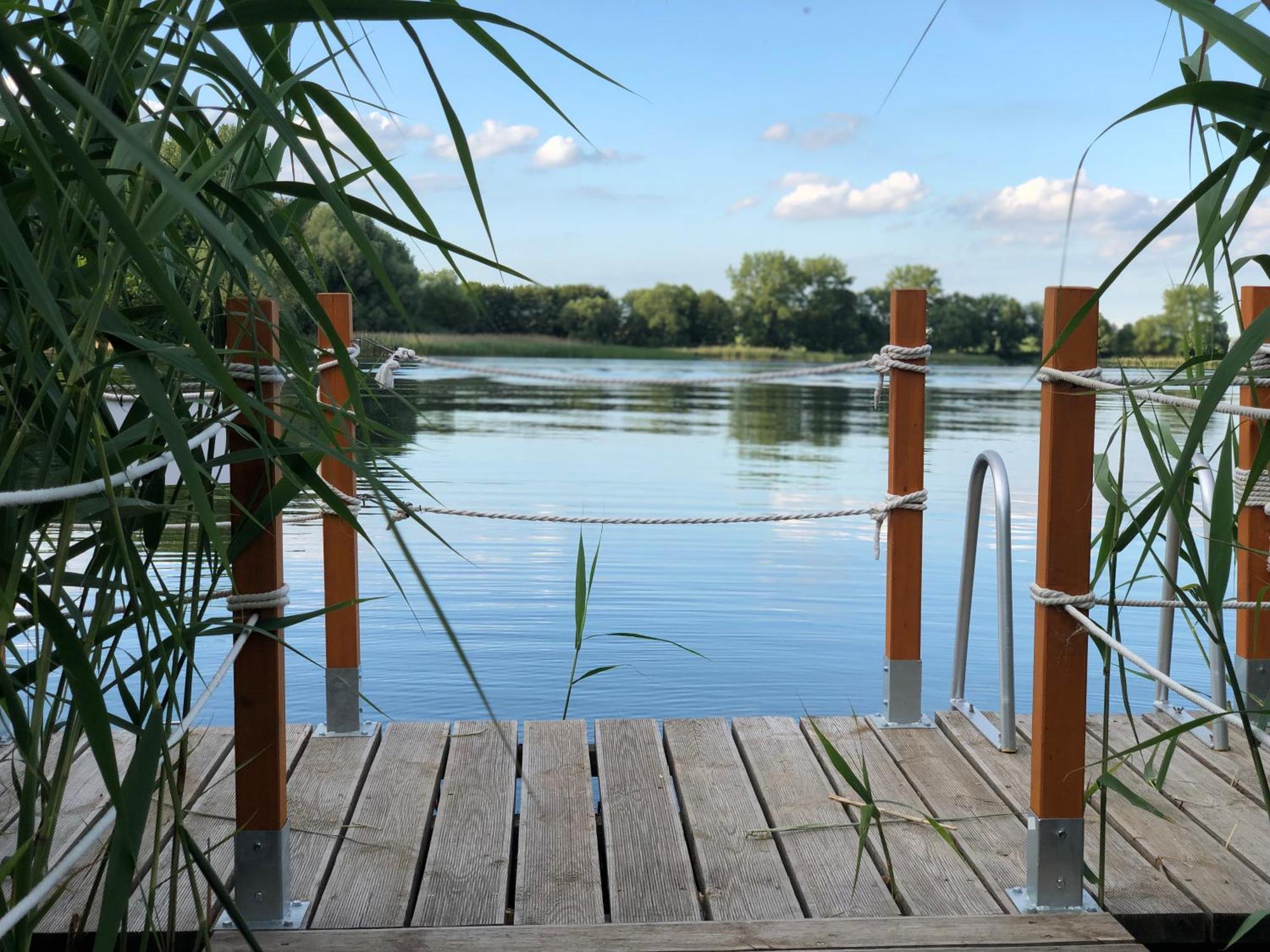 Nglamping Hotel Chełmża Buitenkant foto